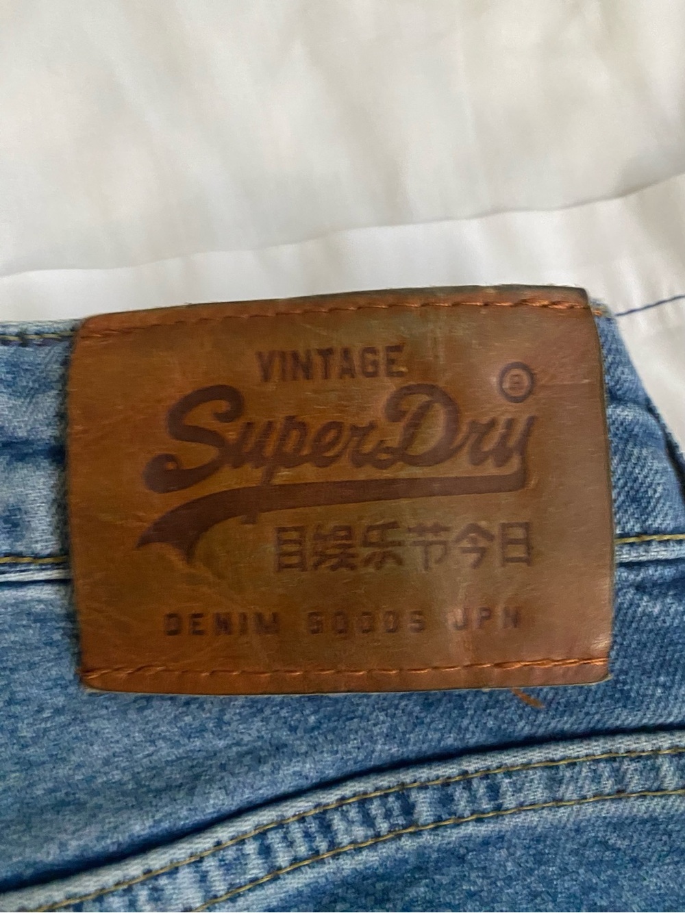 Superdry Brown Leather Patch Jeans with Light Blue Denim